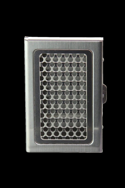 Silver metal grinder card with perforated surface.