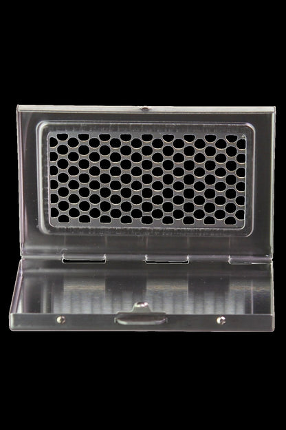 Clear acrylic cannabis grinder card with perforated grinding surface.