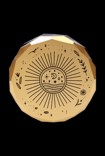 Gold, celestial-patterned cannabis container.