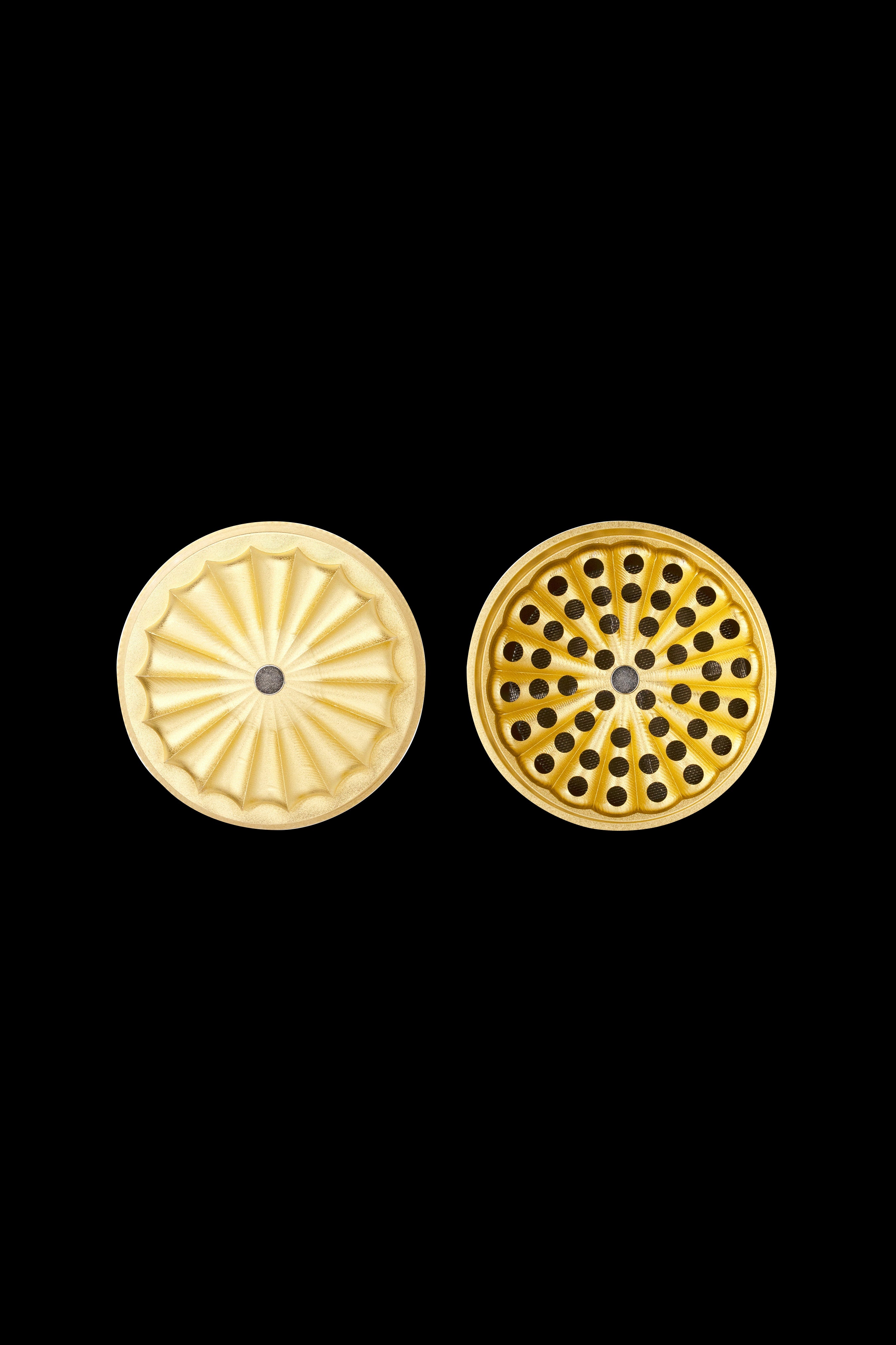 Gold cannabis press plates with patterned surfaces.
