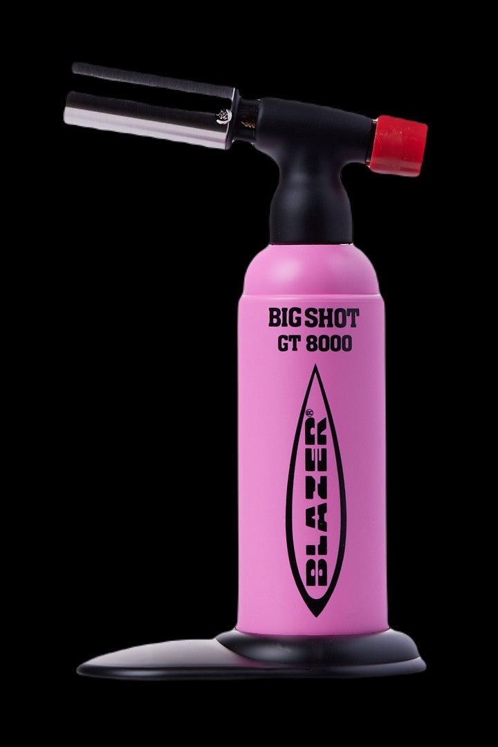 Pink “Big Shot GT 8000” butane torch with black accents, used for dabbing cannabis concentrates.