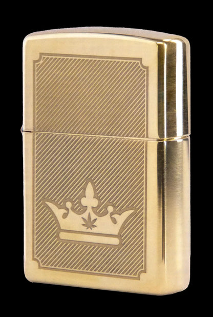Gold Zippo-style lighter engraved with a crown and cannabis leaf.
