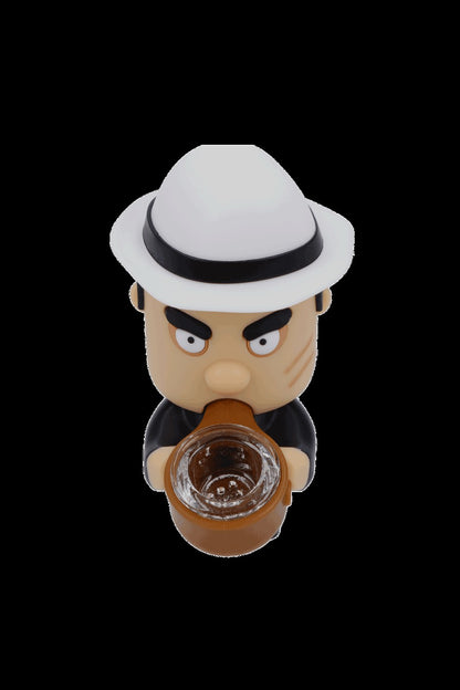 Cartoonish ceramic pipe resembling a stern-faced man in a fedora.