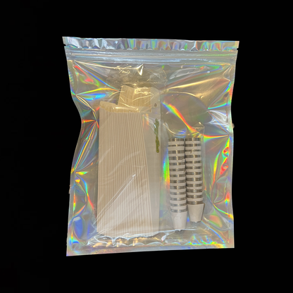 Iridescent mylar bag containing pre-rolled cannabis cigarettes and papers.