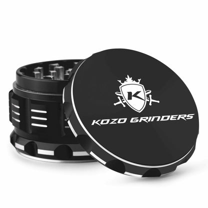 Black Kozo Grinders cannabis grinder with lid partially detached, displaying logo.