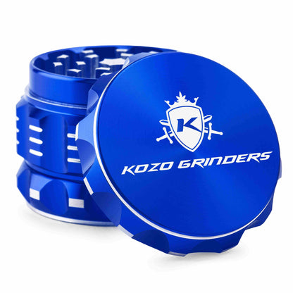 Blue metal cannabis grinder with a white logo and “KOZO GRINDERS” text.