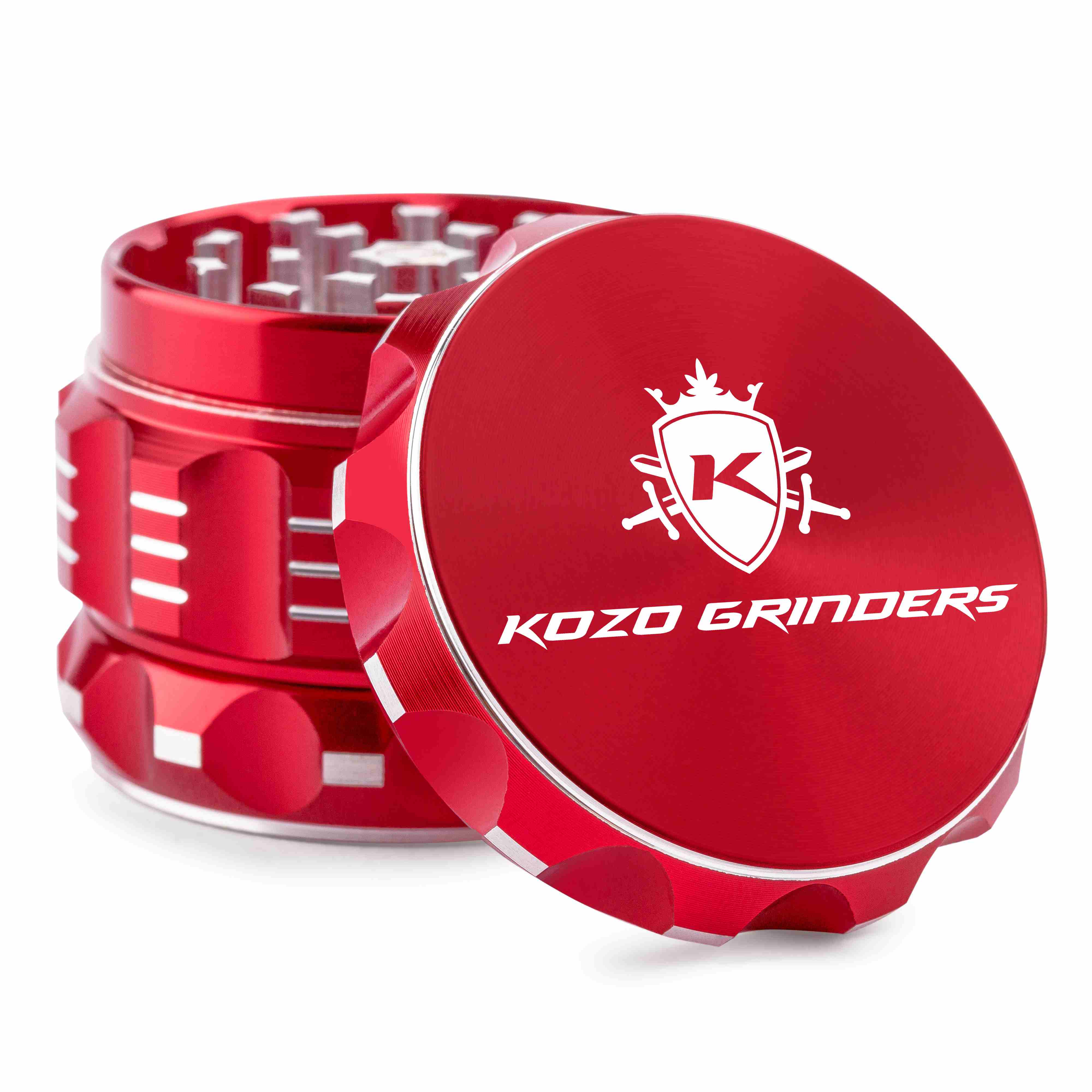 Red Kozo Grinders cannabis grinder with lid open, displaying the grinding teeth.