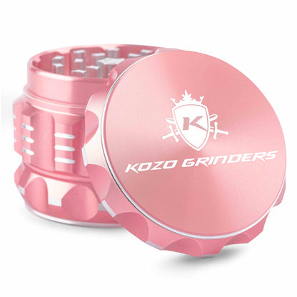 Pink Kozo Grinders cannabis grinder on a white background.