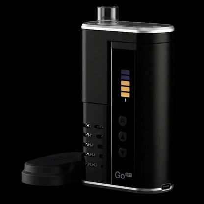 Three-quarter close-up of the black Arizer Go SRT Vaporizer showing its silver-trimmed top, LED level bars, side buttons, and removable mouthpiece against a black background