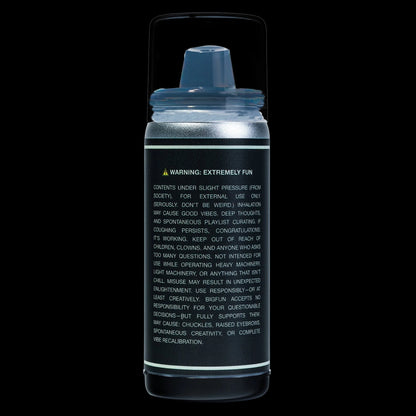 Studio-lit close-up of the BIGFUN! Blinksy Vaporizer showing its capped mouthpiece and detailed warning text on a black background.