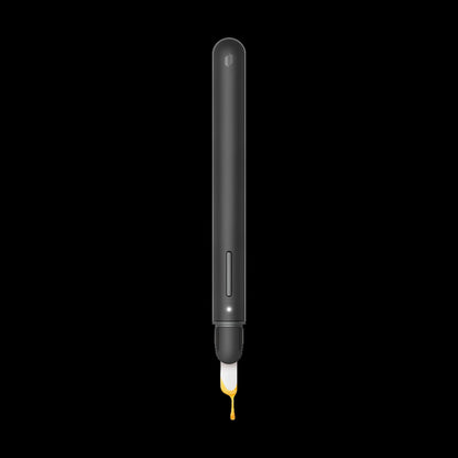 Centered vertical close-up of the Puffco New Hot Knife in haze showing its slim matte body, single button, and a droplet of golden liquid at the tip