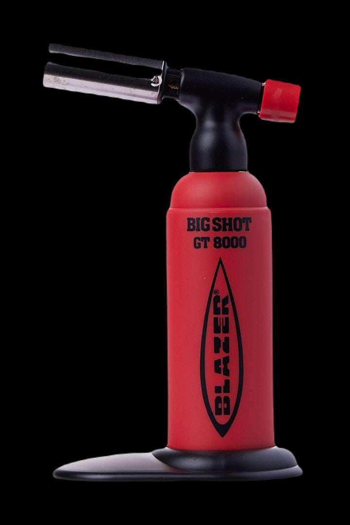 Red butane torch lighter with “Big Shot GT 8000” printed vertically, commonly used for dabbing cannabis concentrates.