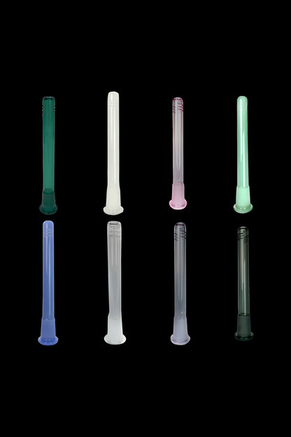 Assortment of colorful glass pipes against a black background.