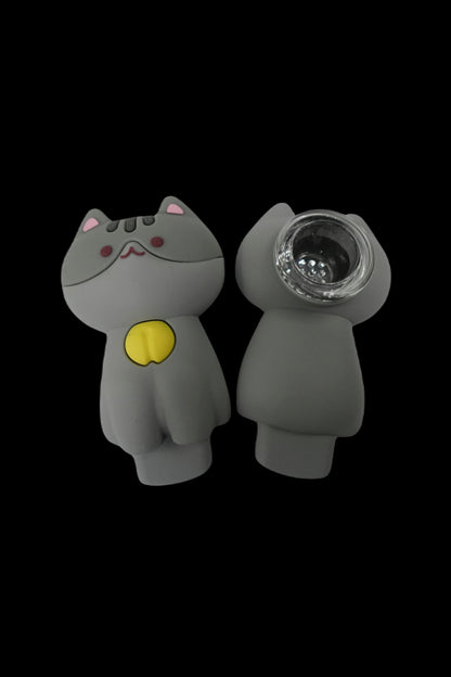 Silicone cat-shaped pipe with a glass bowl, isolated on a black background.