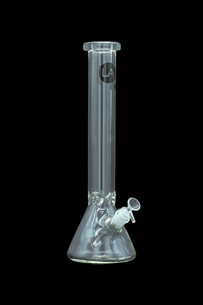 Clear glass water pipe (bong) with ice pinches and a removable downstem, isolated on a black background.