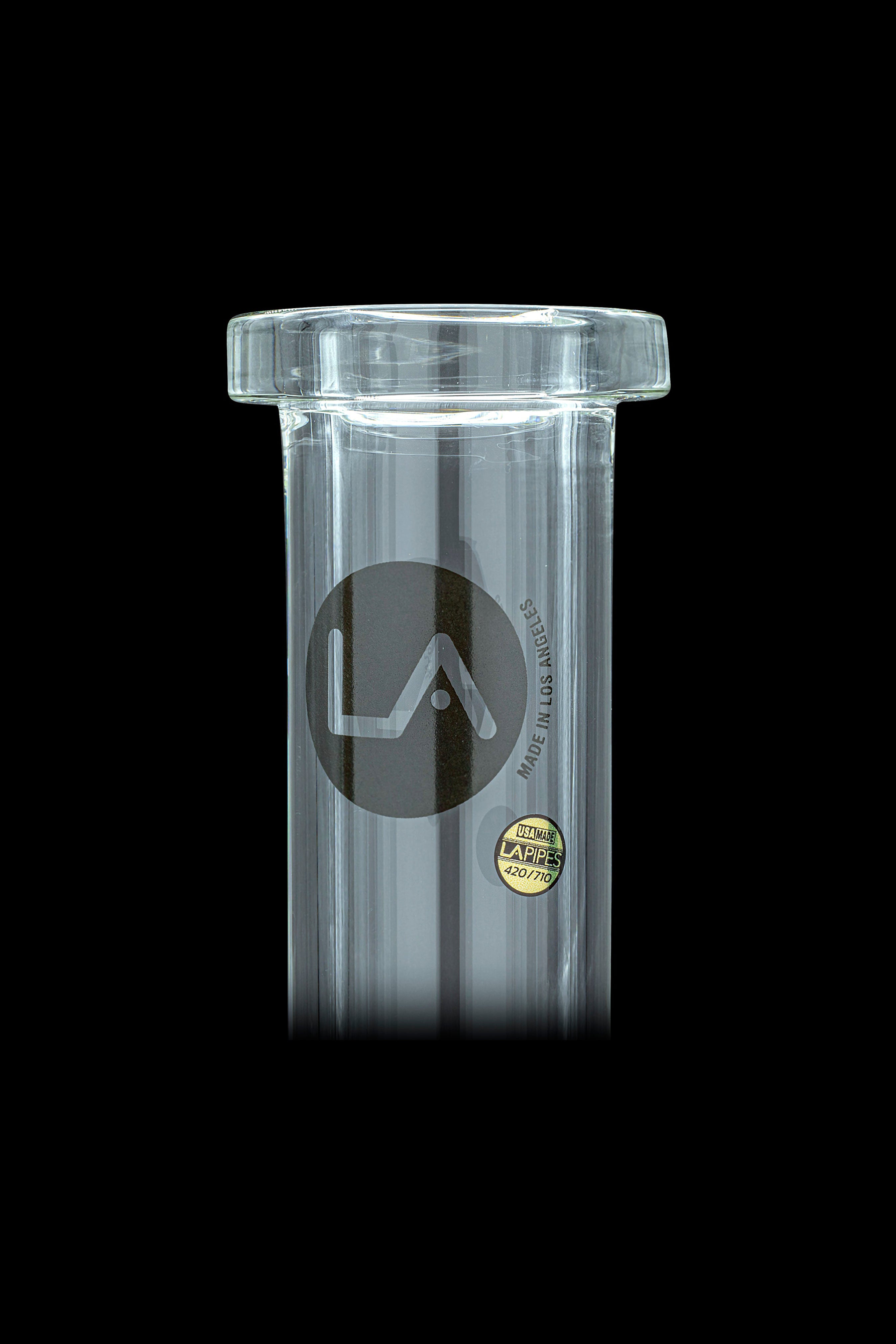 Clear glass water pipe with “LA” logo and “Made in Los Angeles” sticker.
