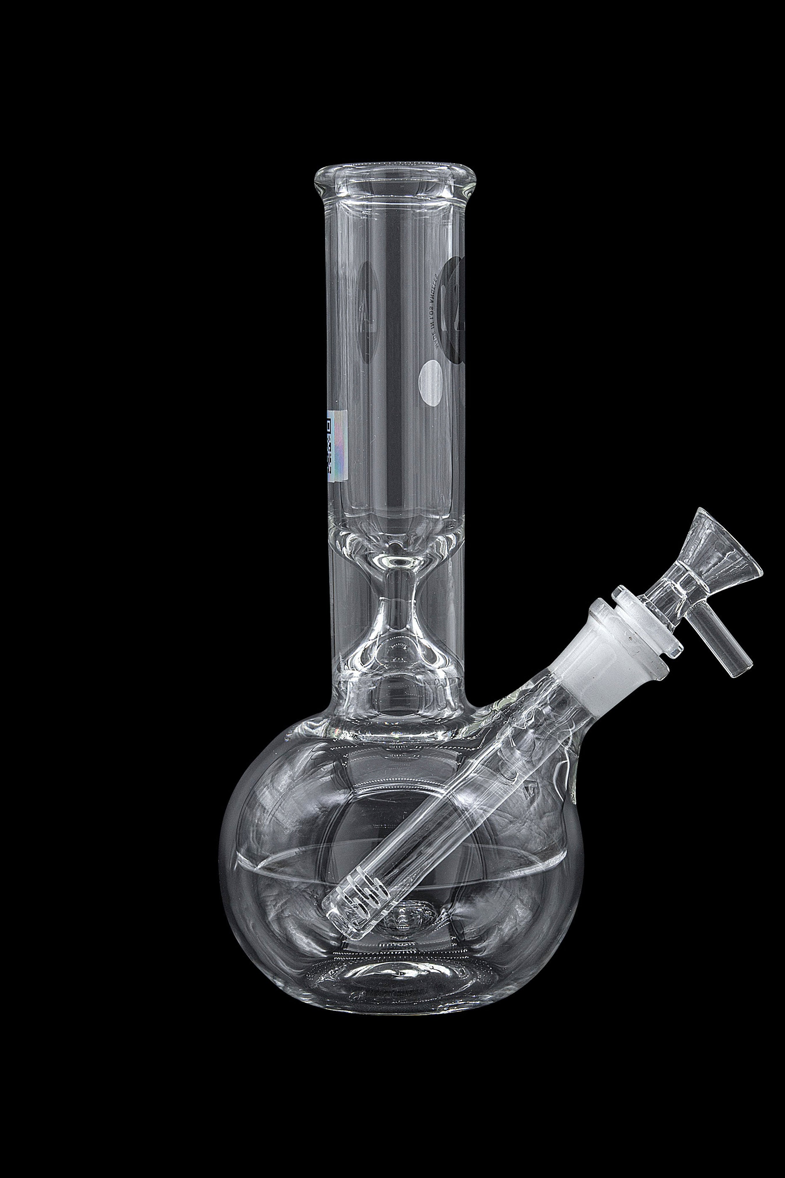 Clear glass water pipe, also known as a bong, with a downstem and bowl, isolated on a black background.