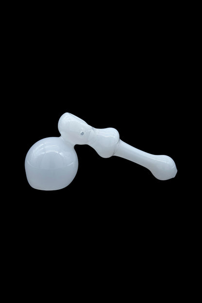 White glass bubbler for smoking cannabis.