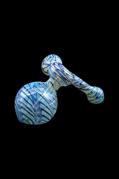 Blue and white patterned glass bubbler for smoking cannabis.