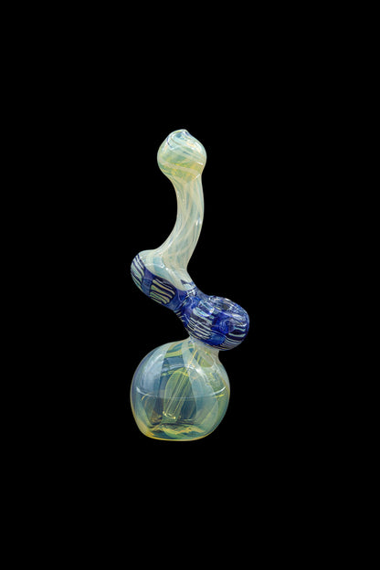 Hand-blown glass bubbler with swirling blue and iridescent yellow patterns, isolated on a black background.