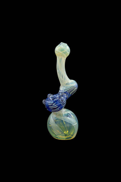 Hand-blown glass bubbler with blue and iridescent yellow swirls, against a black background.