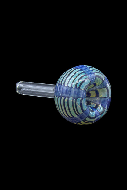 Glass cannabis pipe with blue and green swirling patterns.
