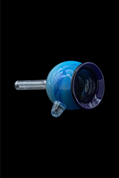 Blue glass bubbler with clear mouthpiece and stem, isolated on black.