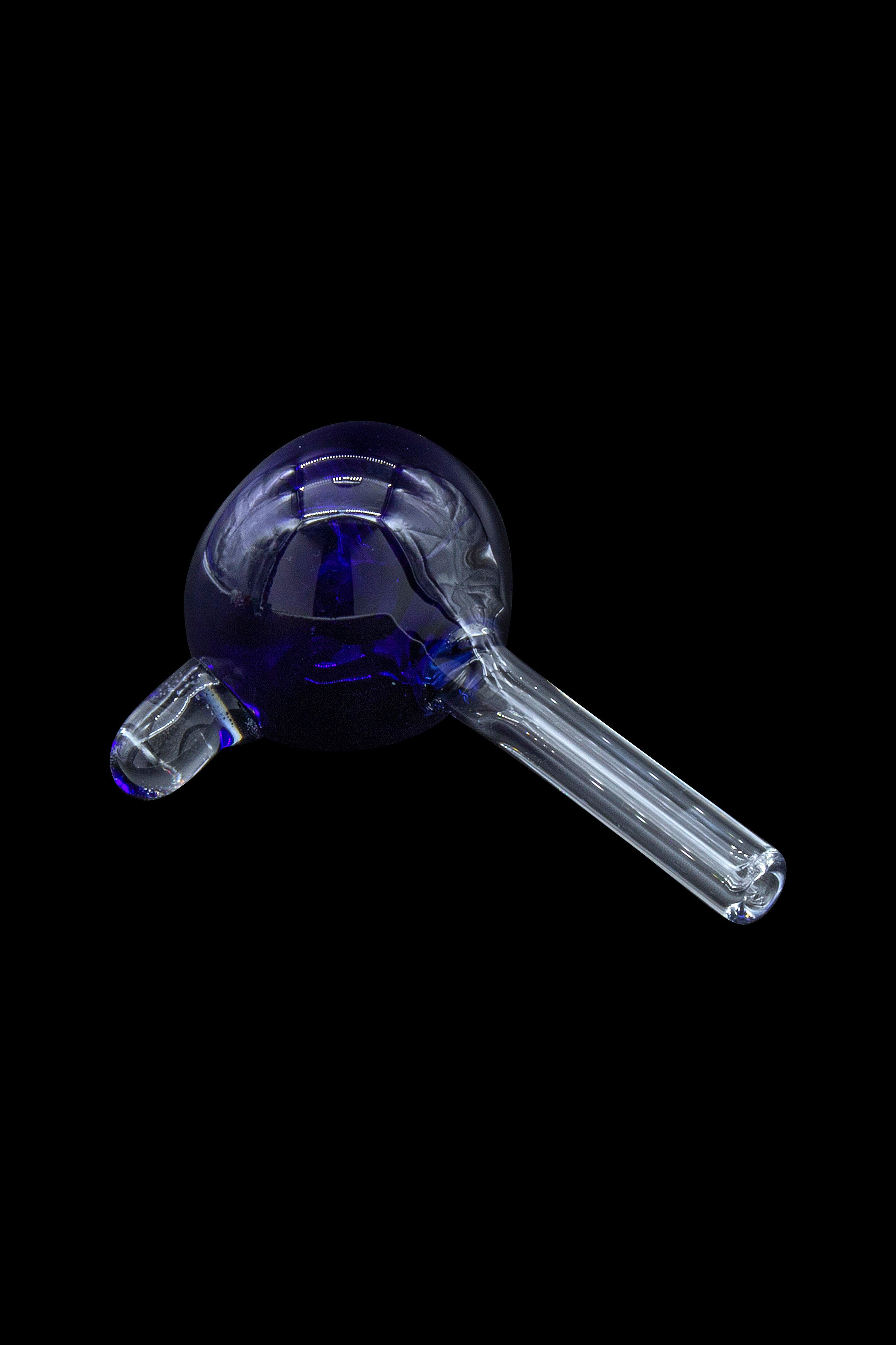 Blue glass oil rig against a black background.