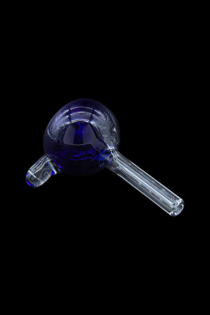 Blue glass oil rig against a black background.