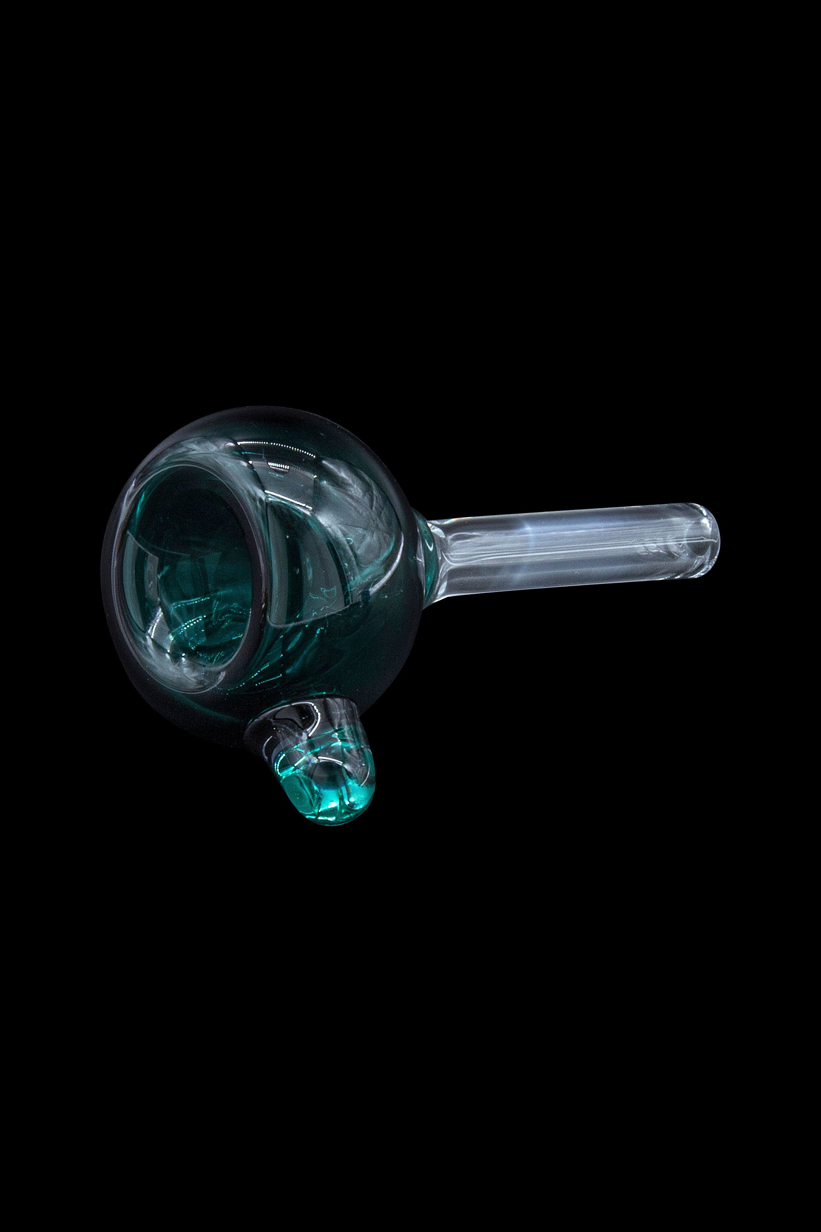 Green glass bubbler pipe against a black background.