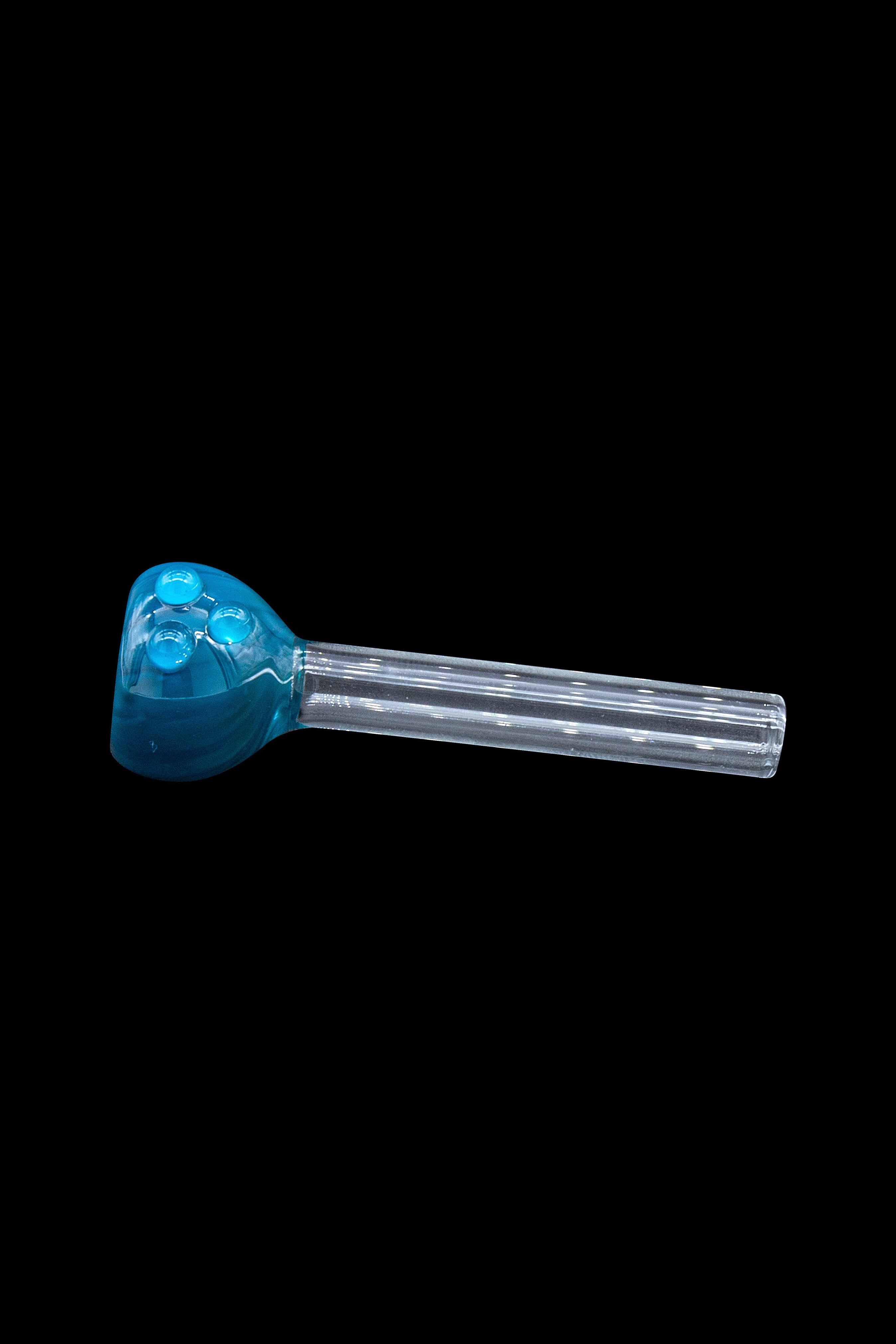 Blue glass pipe with clear stem against a black background.