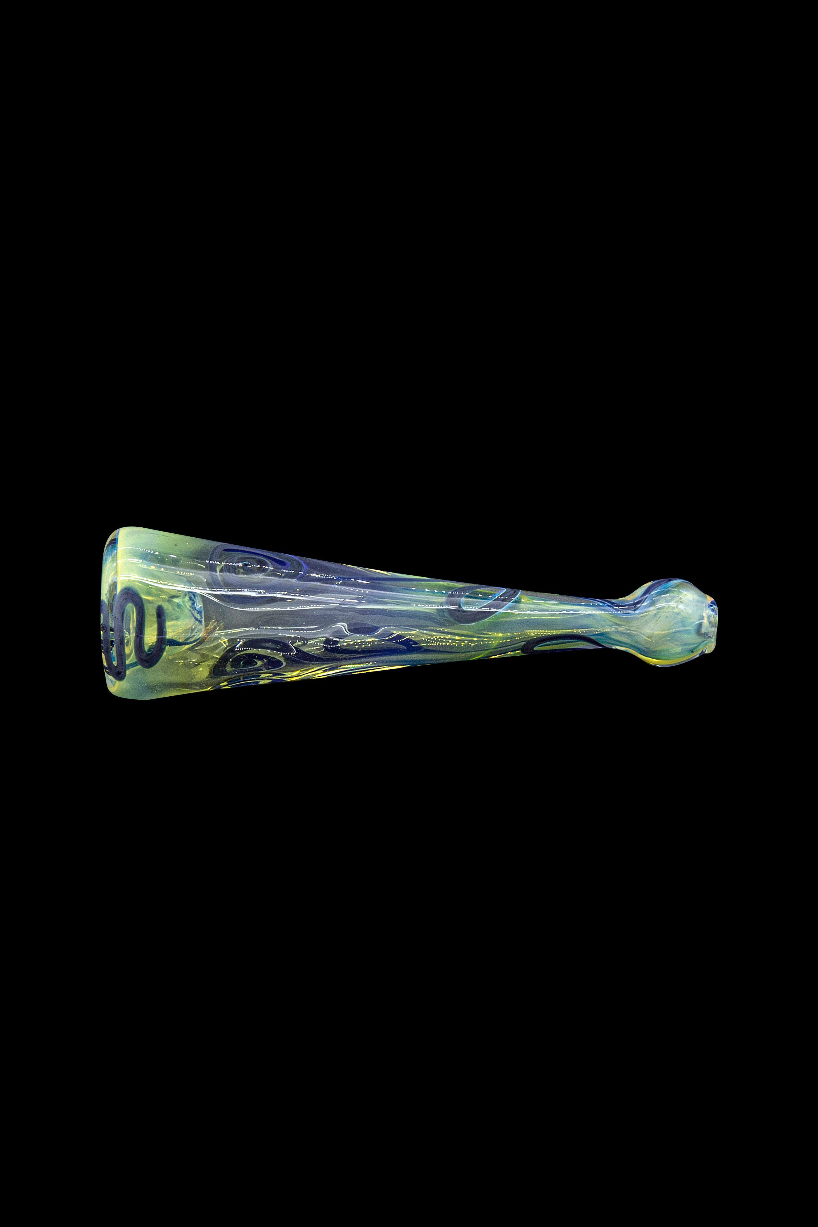 Hand-blown glass cannabis pipe with swirling green and yellow patterns, isolated on a black background.