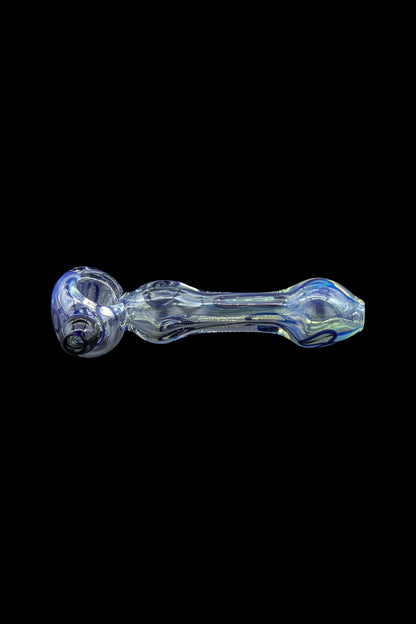 Glass pipe with iridescent blue and silver swirls against a black background.