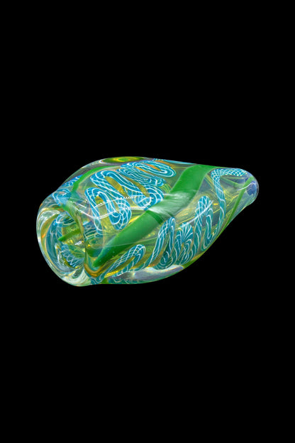 Hand-blown glass cannabis pipe with intricate green and gold swirling patterns.