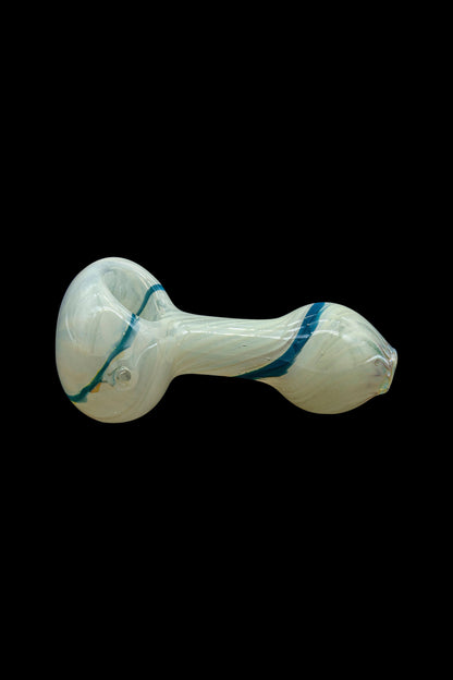 Glass pipe with swirling pale green and blue patterns, isolated on a black background.