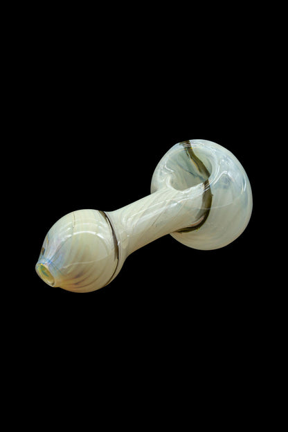 Pale green glass bubbler pipe against a black background.