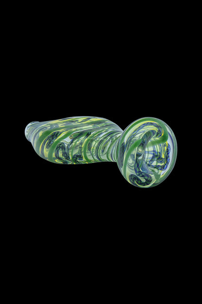 Green and blue glass pipe isolated on a black background.