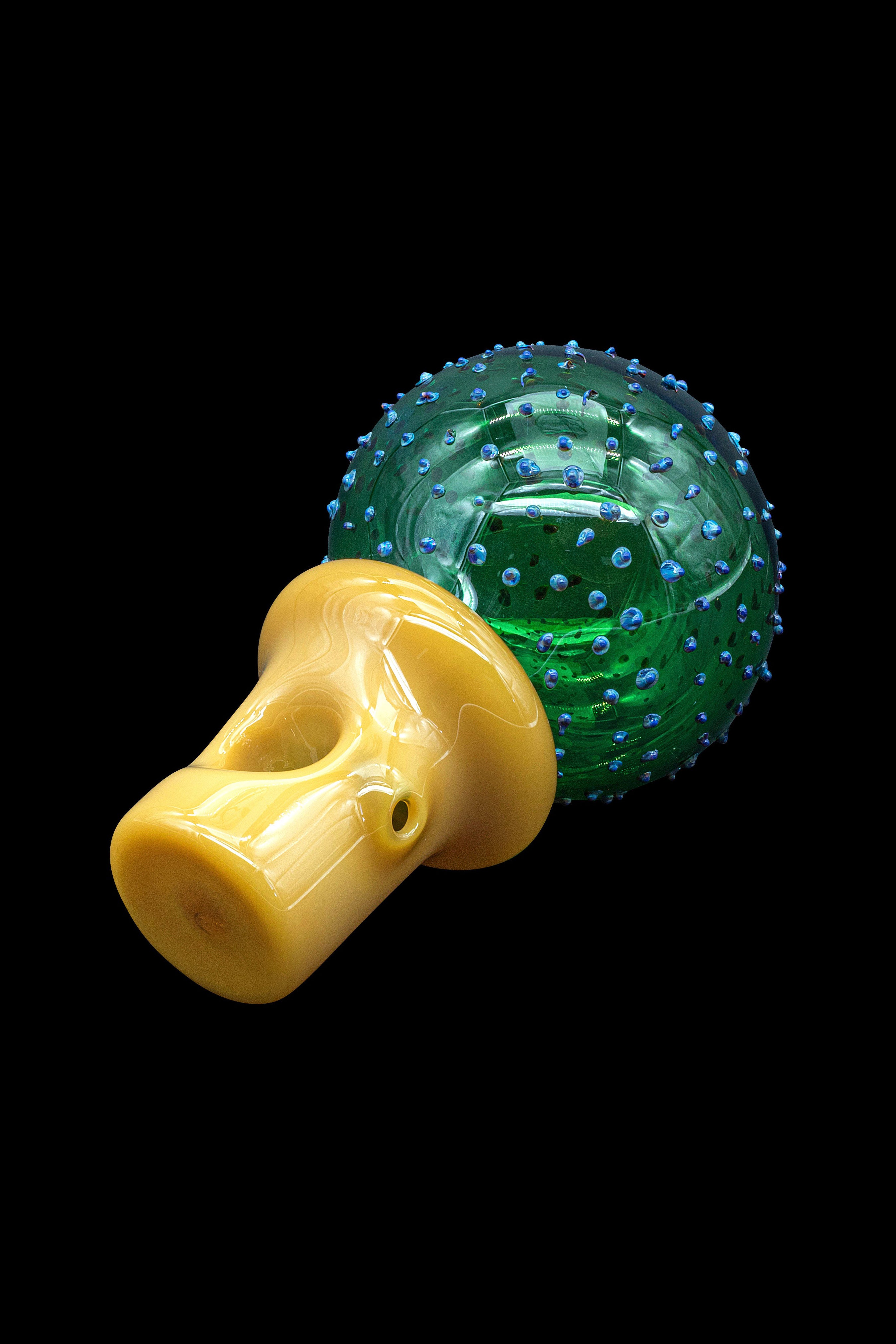 Hand-blown glass mushroom pipe with a textured green and blue base.