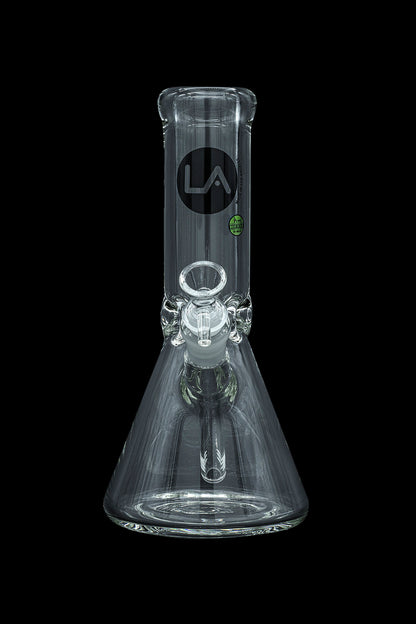 Clear glass bong with a flared base and ice catcher, featuring a “LA” logo.