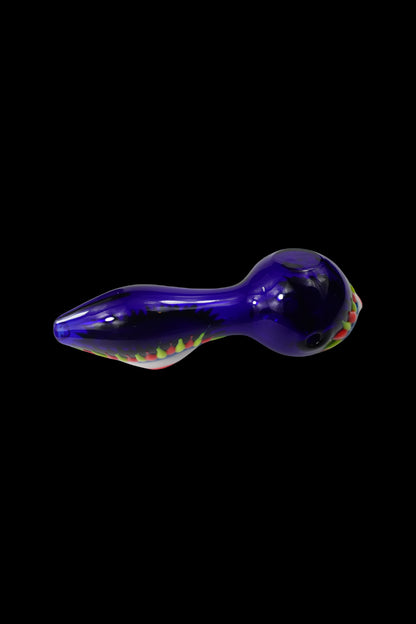 Purple glass pipe with colorful accents, isolated on black.