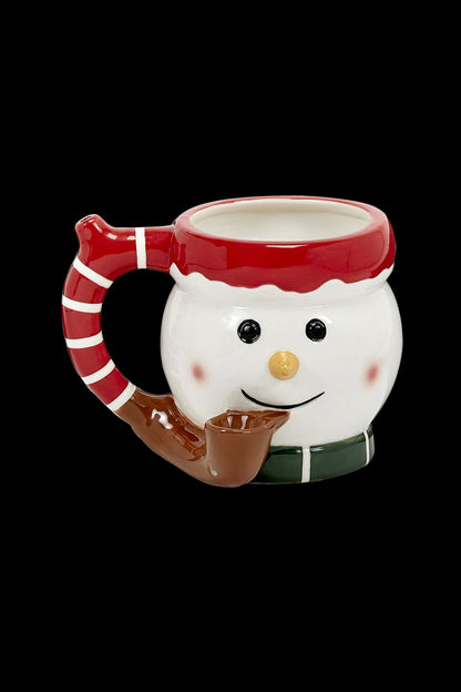 Ceramic snowman pipe with red and white striped handle and hat.
