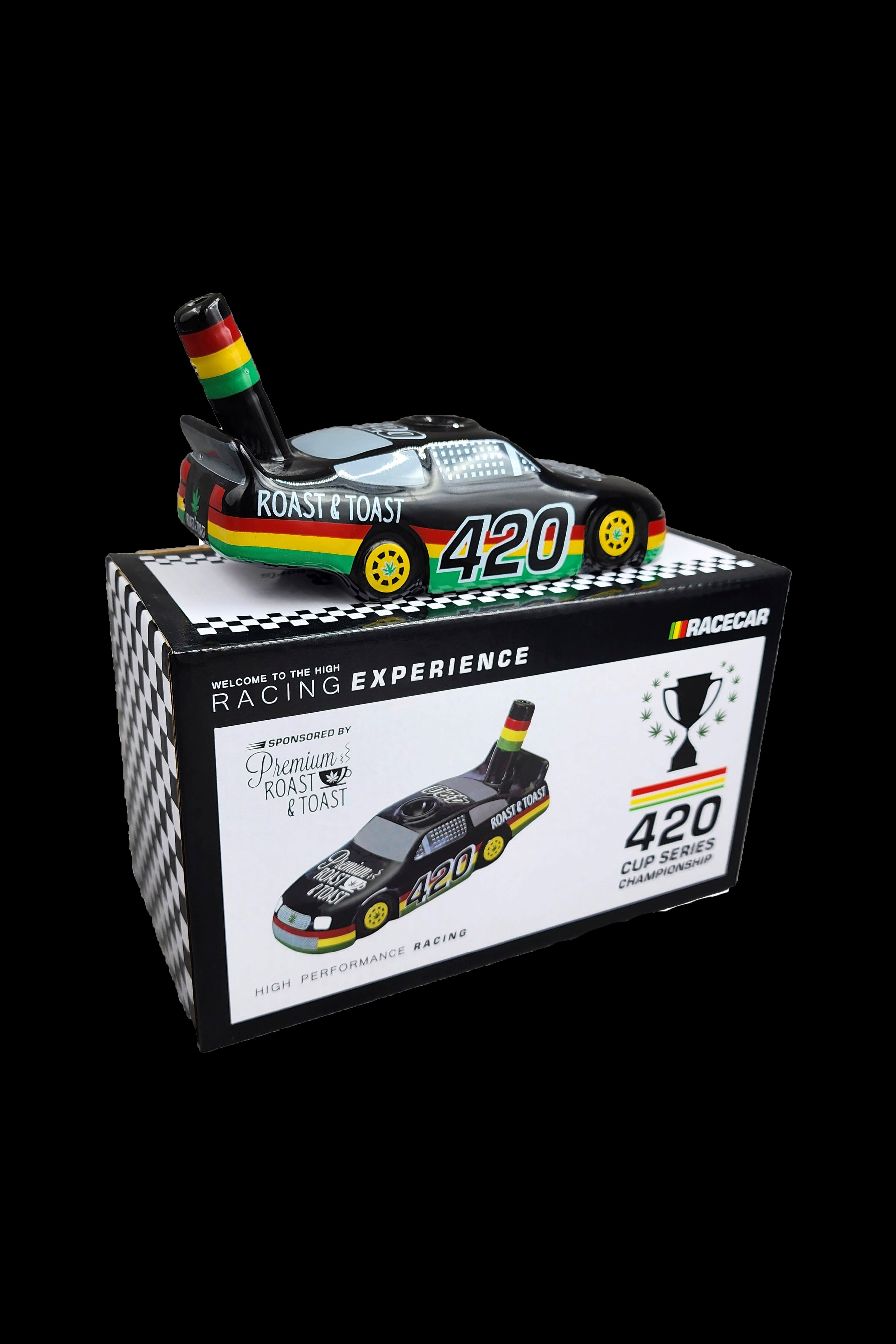 A promotional box for “Roast & Toast” cannabis accessories, designed as a miniature race car display with “420” branding and racing flags.