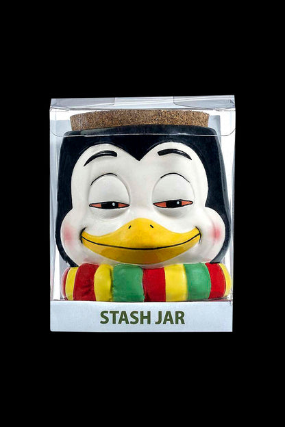 Penguin-shaped ceramic stash jar in packaging, labeled "STASH JAR".