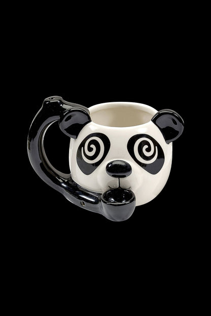 Ceramic panda-shaped smoking pipe with swirling eye patterns and a black mouthpiece.