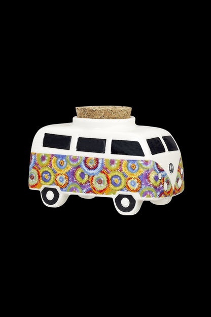 Colorful VW-style bus-shaped cannabis smoking pipe on a black background.