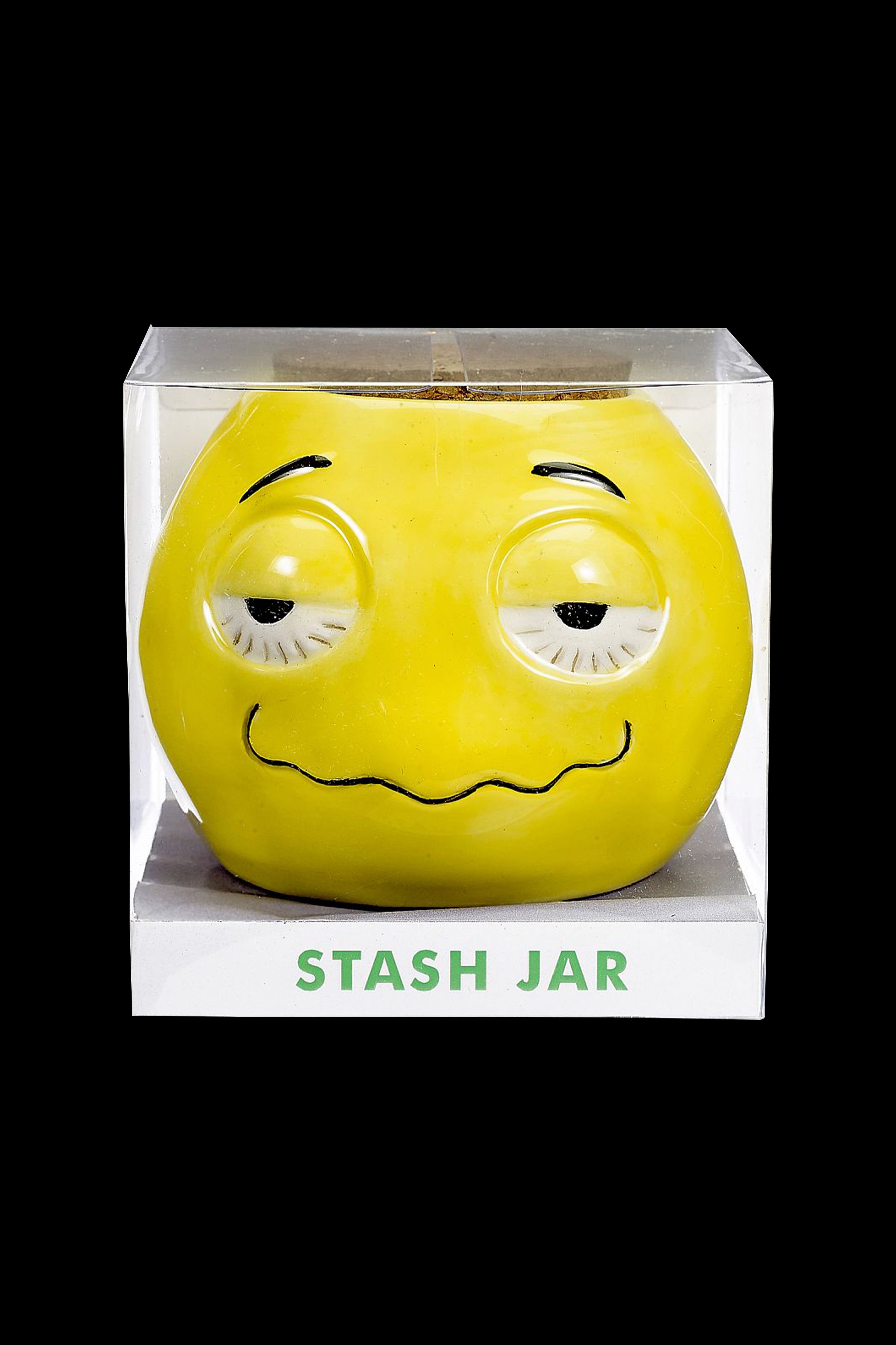 Yellow ceramic stash jar with a smiling, sleepy face in its clear packaging, labeled "STASH JAR".