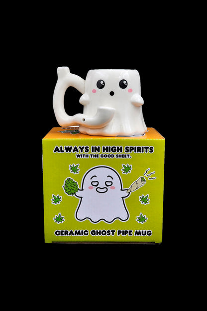 A ceramic mug shaped like a smiling ghost with the packaging displaying a cartoon ghost, cannabis buds, and the text "Always in High Spirits with the Good Sheet" and "Ceramic Ghost Pipe Mug."