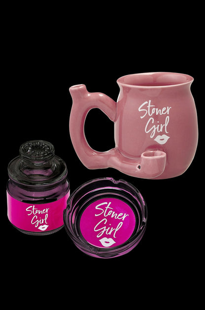 Pink cannabis accessories including a water pipe and two jars labeled “Stoner Girl” with a kiss graphic.