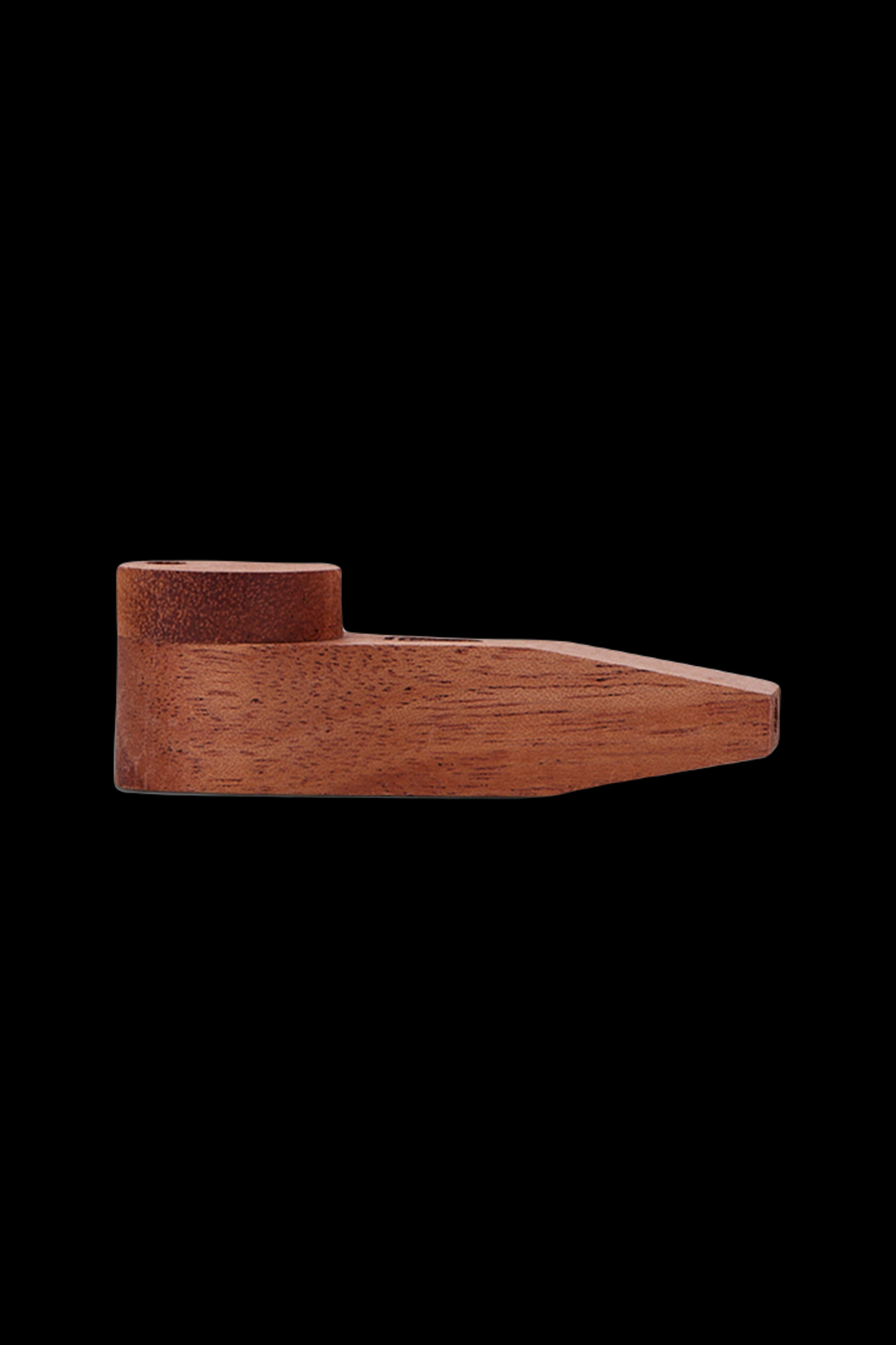Wooden cannabis pipe on a black background.