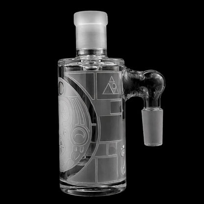 Close-up front view of the Milkyway Maya Wet Ash Catcher showing its etched circular designs and 45° male joint against a black background.